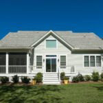 rear elevation of beautiful home with landscaped garden.