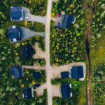 aerial view of rural village, residential area with cottages in finland